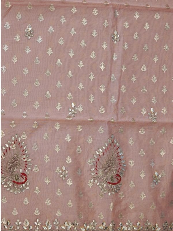 Banarasi suit embellished with Gotta- Patta work accompanied with Bandhani Dupatta